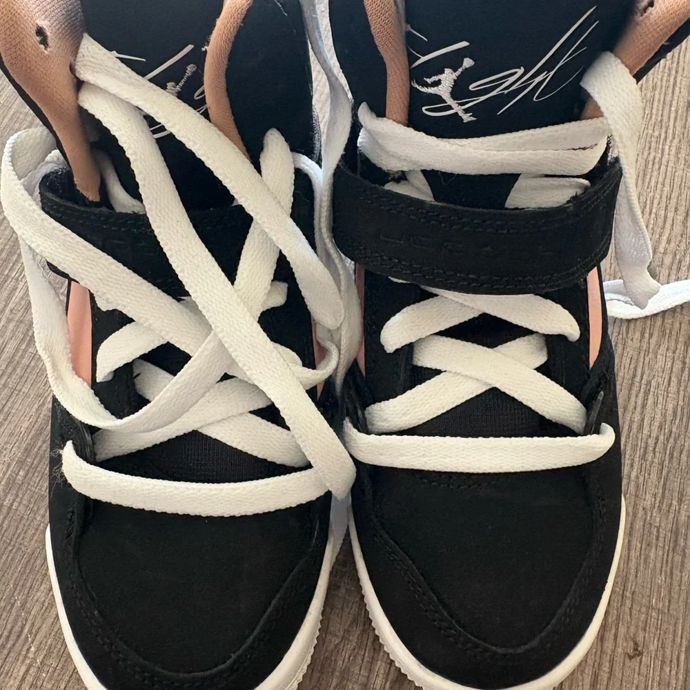 Jordan Kids Black and White Sneakers with Orange Accents